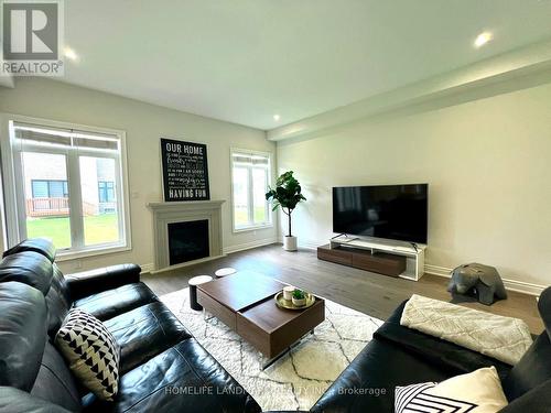 12 Carlinds Crescent, Whitchurch-Stouffville (Ballantrae), ON - Indoor Photo Showing Living Room With Fireplace