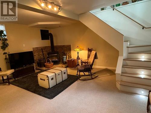 1616 68Th Avenue, Grand Forks, BC - Indoor Photo Showing Other Room With Fireplace