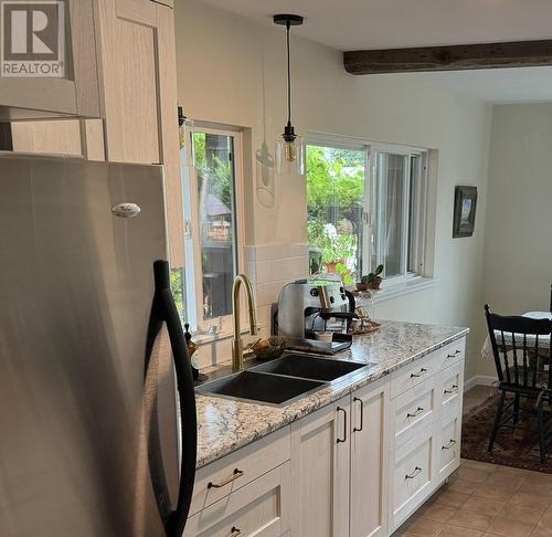 1616 68Th Avenue, Grand Forks, BC - Indoor Photo Showing Kitchen With Double Sink