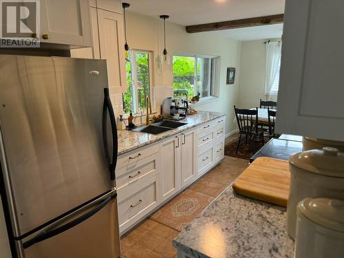 1616 68Th Avenue, Grand Forks, BC - Indoor Photo Showing Kitchen With Double Sink