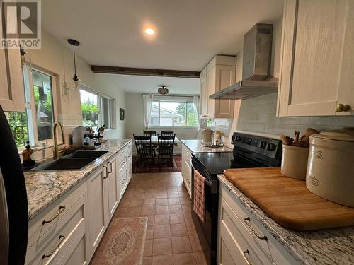 1616 68Th Avenue, Grand Forks, BC - Indoor Photo Showing Kitchen With Double Sink