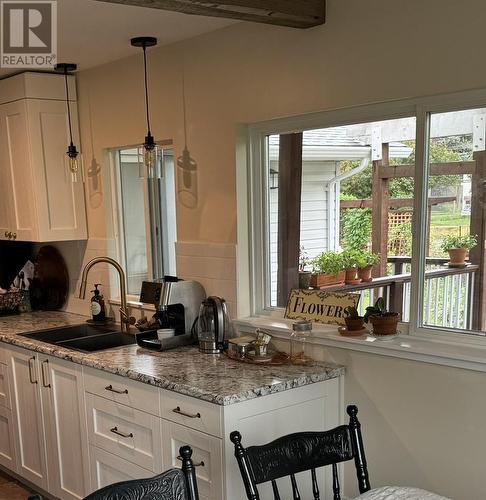 1616 68Th Avenue, Grand Forks, BC - Indoor Photo Showing Kitchen With Double Sink