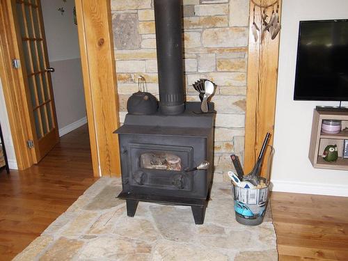 Autre - 41 Rue Yvon, Saint-Alphonse-Rodriguez, QC - Indoor Photo Showing Living Room With Fireplace