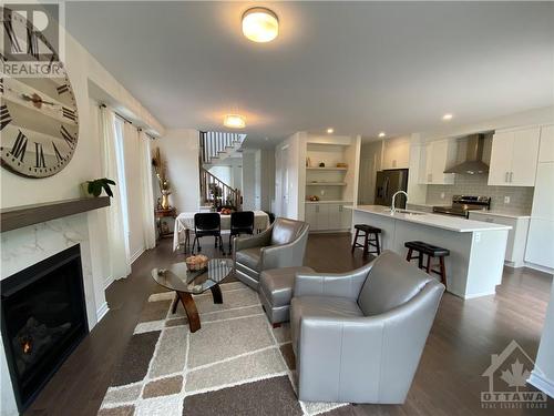 655 Persimmon Way, Ottawa, ON - Indoor Photo Showing Living Room With Fireplace