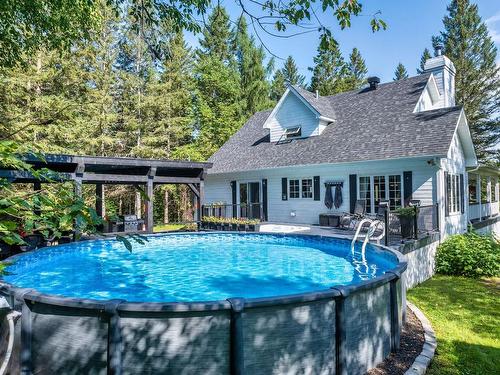 Face arriÃ¨re - 110 7E Rang, Mont-Tremblant, QC - Outdoor With Above Ground Pool