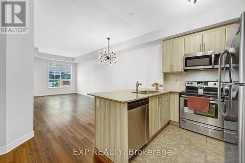 226 - 216 Oak Park Boulevard, Oakville, ON - Indoor Photo Showing Kitchen With Stainless Steel Kitchen With Double Sink