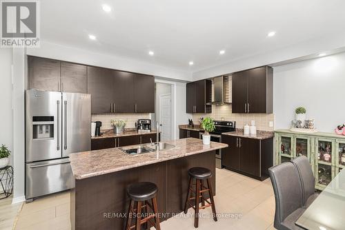 57 Larry Crescent, Haldimand, ON - Indoor Photo Showing Kitchen With Double Sink With Upgraded Kitchen