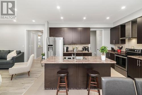 57 Larry Crescent, Haldimand, ON - Indoor Photo Showing Kitchen With Double Sink With Upgraded Kitchen