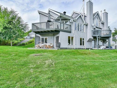 Back facade - 16-330 Rue De La Grande-Corniche, Sainte-Adèle, QC - Outdoor With Deck Patio Veranda