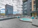 Spa - 716-235 Rue Peel, Montréal (Le Sud-Ouest), QC  - Outdoor With In Ground Pool 