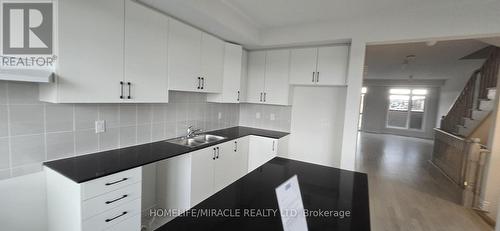 355 Tennant Circle, Vaughan (Vellore Village), ON - Indoor Photo Showing Kitchen With Double Sink