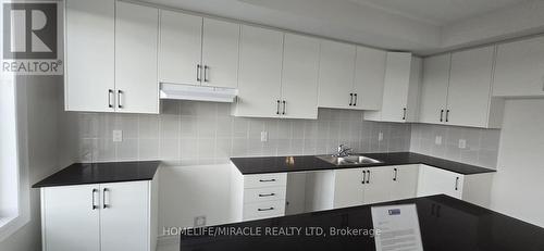 355 Tennant Circle, Vaughan (Vellore Village), ON - Indoor Photo Showing Kitchen With Double Sink