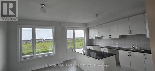 355 Tennant Circle, Vaughan (Vellore Village), ON - Indoor Photo Showing Kitchen With Double Sink