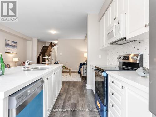 29 Doris Pawley Crescent, Caledon, ON - Indoor Photo Showing Kitchen With Double Sink