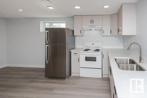 7424 41 Av Nw, Edmonton, AB - Indoor Photo Showing Kitchen With Double Sink