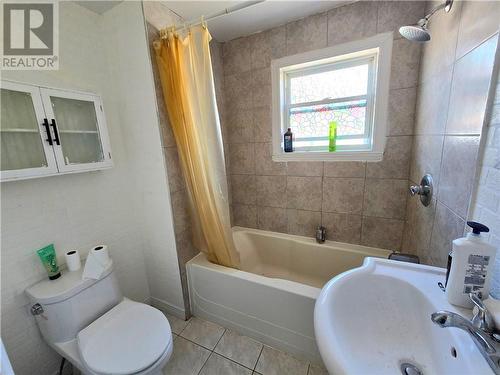 An updated main bathroom on the second floor. - 307-309 Prince Arthur Street, Cornwall, ON - Indoor Photo Showing Bathroom