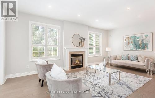 22 Serviceberry Crescent, Brampton (Vales Of Castlemore), ON - Indoor Photo Showing Living Room With Fireplace