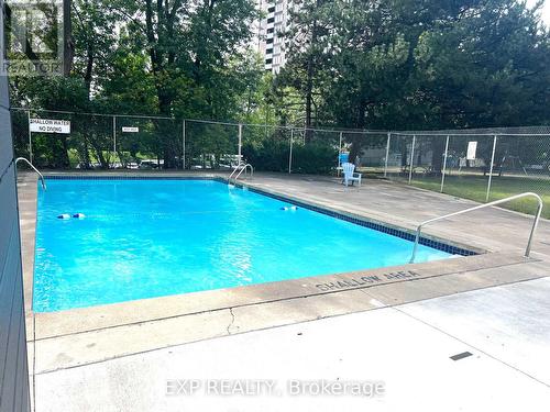 407 - 3120 Kirwin Avenue, Mississauga (Cooksville), ON - Outdoor With In Ground Pool With Backyard