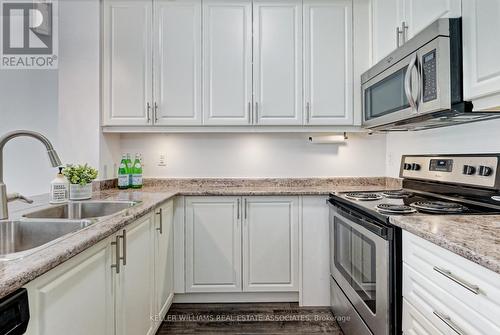 111 - 35 Southshore Crescent, Hamilton (Stoney Creek), ON - Indoor Photo Showing Kitchen With Double Sink With Upgraded Kitchen