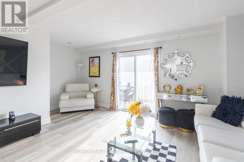 22 - 8136 Coventry Road, Niagara Falls, ON - Indoor Photo Showing Living Room