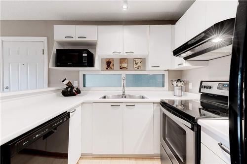 2040 Cleaver Avenue|Unit #304, Burlington, ON - Indoor Photo Showing Kitchen With Double Sink