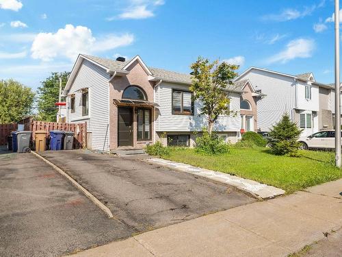 Family room - 303 Rue P.-É.-Borduas, Laval (Sainte-Rose), QC - Outdoor With Facade