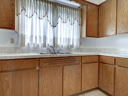 Cuisine - Rdc-7335 Rue De Cannes, Montréal (Saint-Léonard), QC - Indoor Photo Showing Kitchen With Double Sink