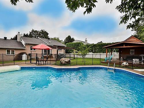 Cour - 346 Rue De La Mésange, Rosemère, QC - Outdoor With In Ground Pool With Backyard