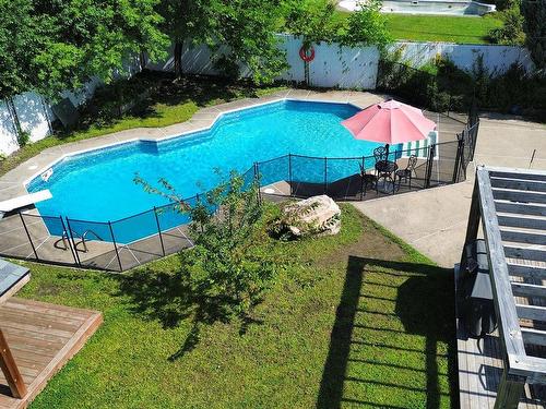 Piscine - 346 Rue De La Mésange, Rosemère, QC - Outdoor With In Ground Pool With Backyard