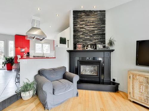 Living room - 346 Rue De La Mésange, Rosemère, QC - Indoor Photo Showing Living Room With Fireplace