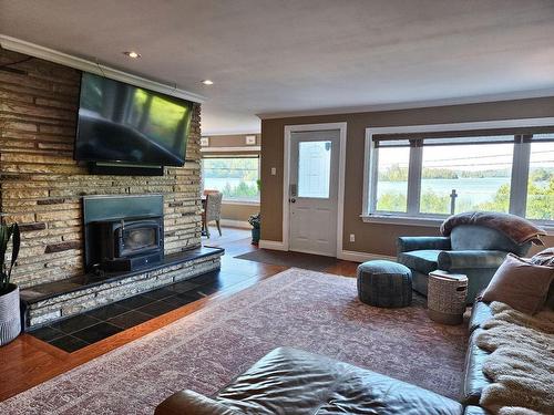 Living room - 96 Ch. Du Lac-Louisa N., Wentworth, QC - Indoor Photo Showing Living Room With Fireplace