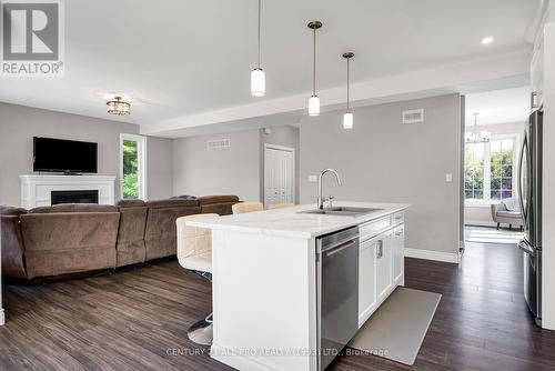 134 Lawson Road, Brighton, ON - Indoor Photo Showing Kitchen With Fireplace With Upgraded Kitchen