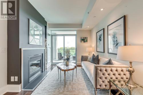 417 - 11 Bronte Road, Oakville (Bronte West), ON - Indoor Photo Showing Living Room With Fireplace