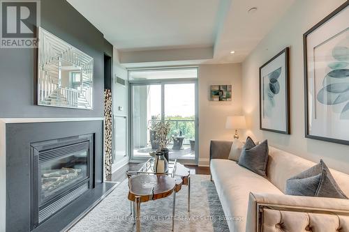 417 - 11 Bronte Road, Oakville (Bronte West), ON - Indoor Photo Showing Living Room With Fireplace