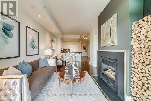 417 - 11 Bronte Road, Oakville (Bronte West), ON - Indoor Photo Showing Living Room With Fireplace