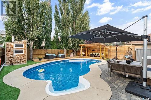 722 Brookhurst Lane, Saskatoon, SK - Outdoor With In Ground Pool With Deck Patio Veranda With Backyard