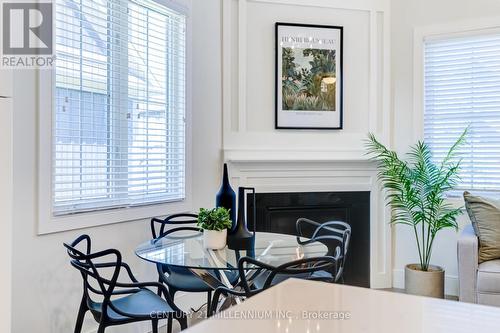 133 Yellow Birch Crescent, Blue Mountains (Blue Mountain Resort Area), ON - Indoor Photo Showing Dining Room With Fireplace