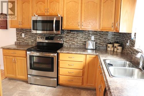 4-6 Whites Avenue, Stephenville, NL - Indoor Photo Showing Kitchen With Double Sink