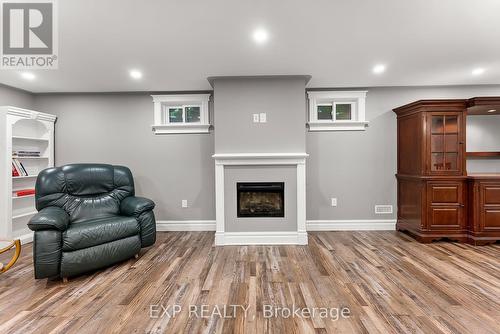 7949 Grossi Court, Niagara Falls, ON - Indoor Photo Showing Other Room With Fireplace