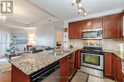 204 - 8 Maison Parc Court, Vaughan, ON - Indoor Photo Showing Kitchen With Stainless Steel Kitchen With Double Sink