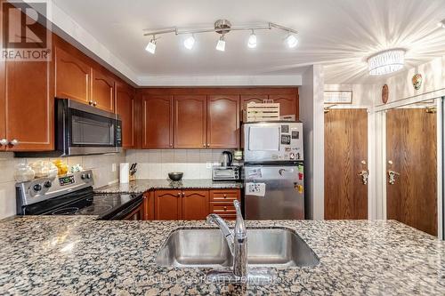 204 - 8 Maison Parc Court, Vaughan, ON - Indoor Photo Showing Kitchen With Double Sink