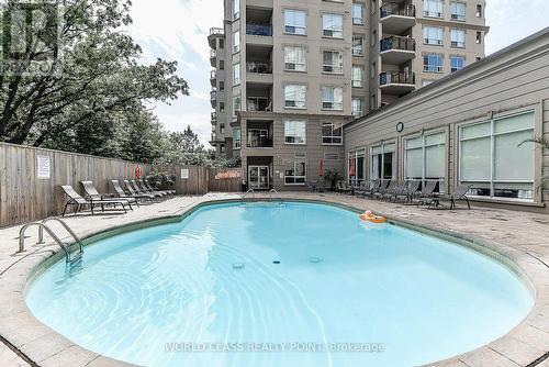 204 - 8 Maison Parc Court, Vaughan, ON - Outdoor With In Ground Pool