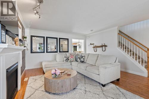 56 Mapleridge Crescent, Thames Centre (Dorchester), ON - Indoor Photo Showing Living Room With Fireplace