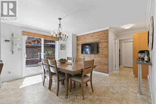 Huge Eating Area overlooking deck, yard & hot tub. - 56 Mapleridge Crescent, Thames Centre (Dorchester), ON - Indoor Photo Showing Dining Room