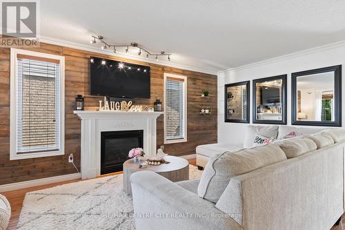 Large Living Room with Accent Wall & Gas Fireplace - 56 Mapleridge Crescent, Thames Centre (Dorchester), ON - Indoor Photo Showing Living Room With Fireplace