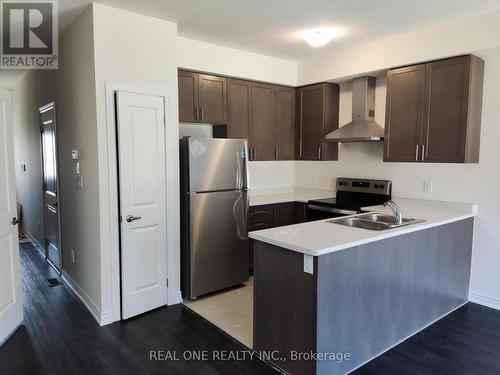 23 Genoa Drive, Hamilton (Jerome), ON - Indoor Photo Showing Kitchen With Stainless Steel Kitchen With Double Sink