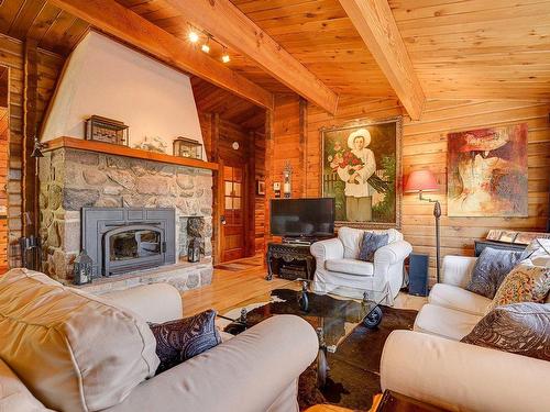 Salon - 10 Rue Jean, Morin-Heights, QC - Indoor Photo Showing Living Room With Fireplace