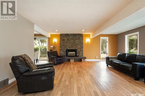 3445 Caen Street, Saskatoon, SK - Indoor Photo Showing Living Room With Fireplace