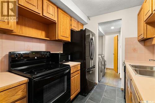 5114 10Th Avenue, Regina, SK - Indoor Photo Showing Kitchen With Double Sink