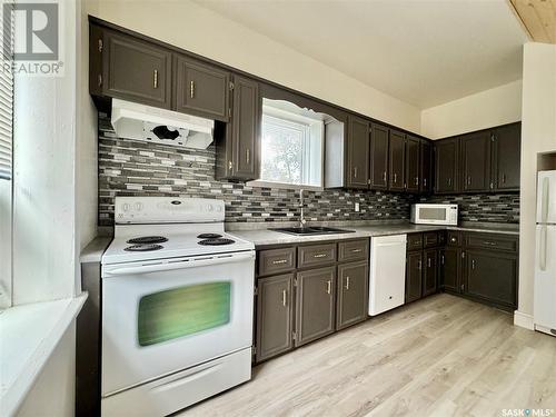 24 Agricultural Avenue, Yorkton, SK - Indoor Photo Showing Kitchen With Double Sink